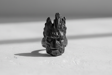Front view of handcrafted 925 sterling silver Groot ring with detailed wood texture and expressive eyes