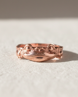 Rose gold plated 925 sterling silver frog ring with textured details displayed on a light background