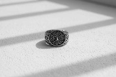 Front view of men's silver Tree of Life ring with deep relief carving and Norse mythology design elements