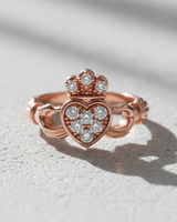 Rose gold plated 925 sterling silver Claddagh ring featuring pave set crystal heart and crown detail
