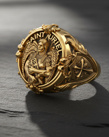 Gold vermeil Saint Uriel ring featuring archangel with sword and shield on dark textured background