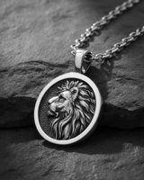 Angled side view of sterling silver lion medallion showing sturdy bail and polished metal craftsmanship
