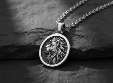 Angled side view of sterling silver lion medallion showing sturdy bail and polished metal craftsmanship