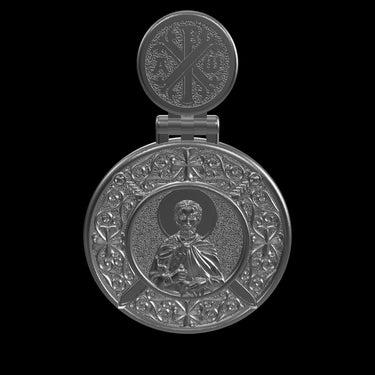 Angled view of double-sided religious pendant displaying both saint and angel sides with connecting charm