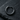 Black rhodium plated 925 sterling silver segmented hoop earring displayed on a textured dark stone background